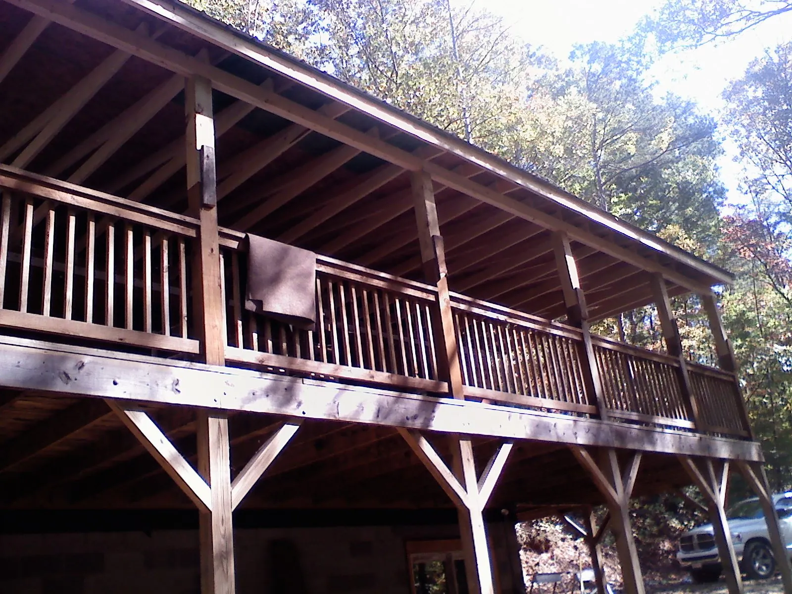 Timber framing under a new elevated porch and deck — Roof Leak Repair in Canistota by Roofing Brothers